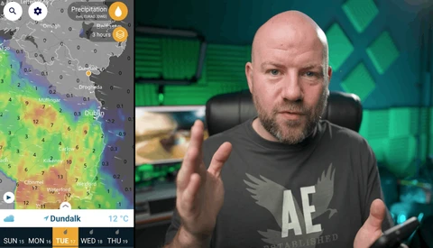 Man in dark shirt gesturing while speaking, with weather radar map visible on left side of frame.