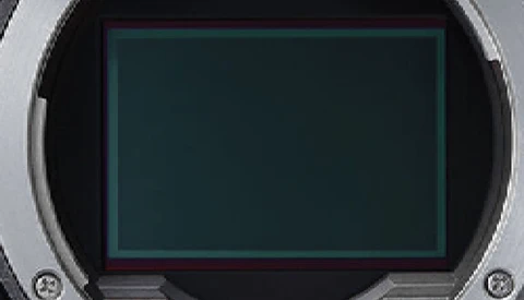Screenshot of a camera's LCD screen displaying a blank teal-colored viewfinder display.