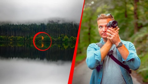 Man in blue shirt holding binoculars with forest lake landscape circled in red on left side.