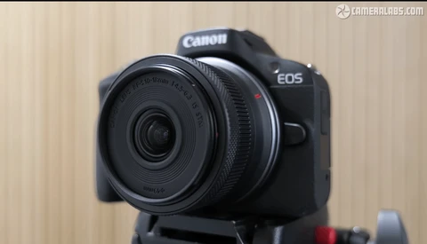 Canon EOS R50 mirrorless camera with RF 24mm f/4.5 macro lens mounted on tripod.