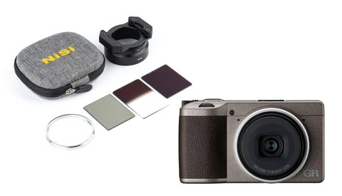 Ricoh GR III compact digital camera with filter kit and carrying case.