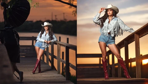 Woman in cowboy hat and denim shorts posing on wooden deck at golden hour sunset.