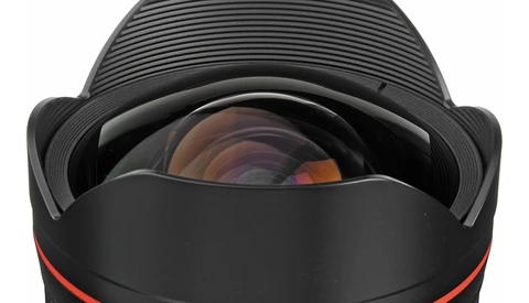 Wide-angle lens with red accent ring and lens hood, viewed from front showing glass elements.