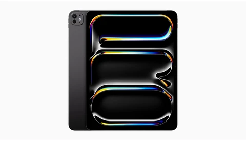 iPad Pro tablet and iPhone displaying neon-outlined shapes on black screens.