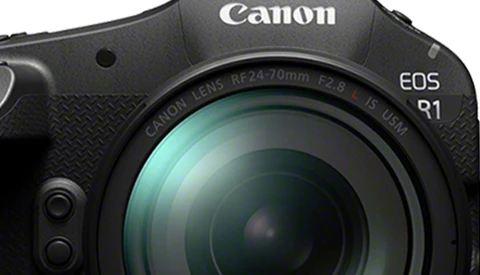 Canon EOS R1 mirrorless camera with RF24-70mm f/2.8L lens attached, front-facing view.