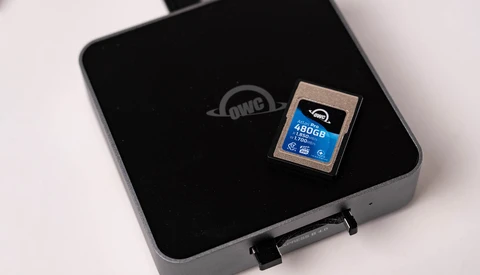 OWC brand external storage device with a 480GB SD memory card displayed on its black surface.