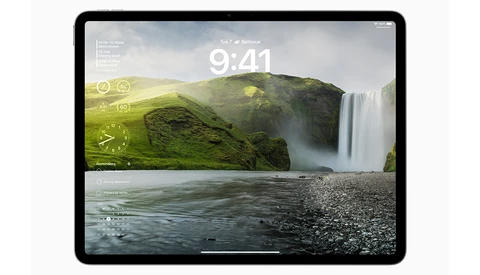 Screenshot of iPad lock screen displaying a waterfall landscape with time 9:41 and weather widgets.
