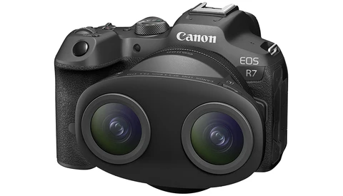 Canon EOS R7 mirrorless camera with dual lens setup mounted on front.