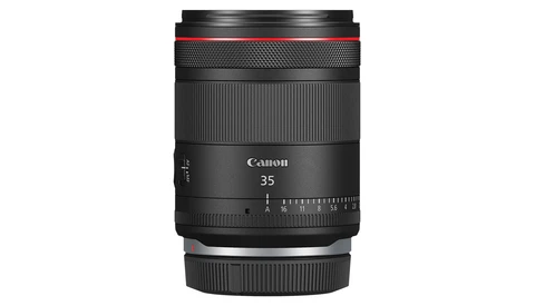 Canon RF 35mm f/1.8 macro lens with focus distance scale and distance markings visible on barrel.