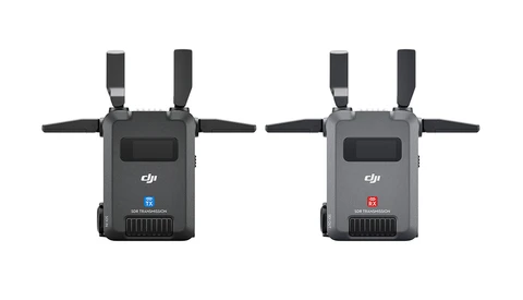 Two DJI wireless transmitter units shown front-facing with extended antenna arms.