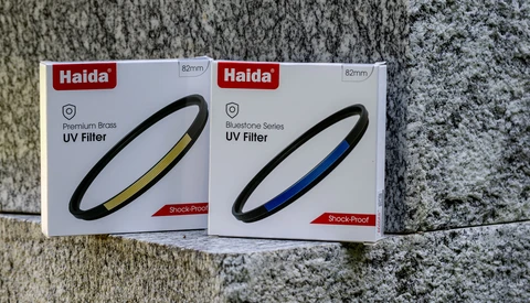 Two Haida 82mm UV filter boxes displayed side by side on a textured gray surface.