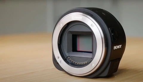 Sony mirrorless camera body with open mount showing sensor and mirror mechanism.