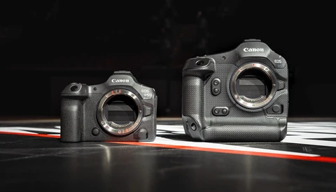Canon R5 and R6 mirrorless cameras displayed body-to-body against black background with red and white line accent.