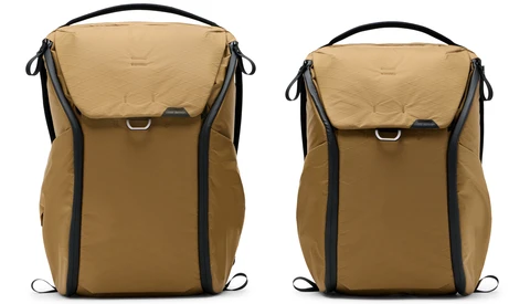 Two tan and black camera backpacks displayed side by side, showing different size options.