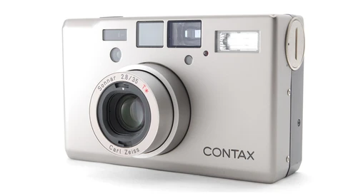 Contax compact film camera with Carl Zeiss lens, shown from front-right angle against white background.