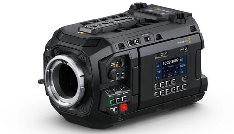 Professional digital cinema camera with large touchscreen interface and extensive control buttons.