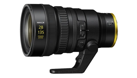 Nikon Z 28-135mm f/2.8-4 NOCT telephoto zoom lens with yellow trim and integrated tripod collar.