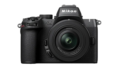 Nikon Z mirrorless camera with attached 24-70mm kit lens, front-facing view against white background.