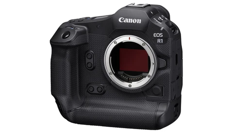 Canon EOS R1 mirrorless camera body shown from front angle with lens mount visible.