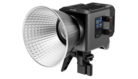 Professional LED studio light with large reflector dish and mounted control panel.