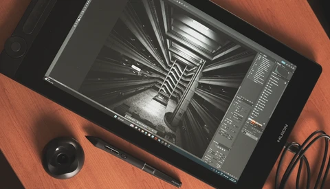 Screenshot of 3D rendering software displaying a geometric spiral staircase visualization on a tablet.