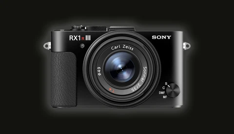Sony RX1R III compact camera with fixed Carl Zeiss lens against dark background.