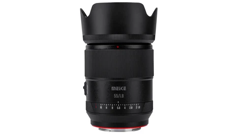 Meike 55mm f/8 lens with lens hood attached, shown against white background.