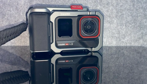 Two Insta360 Ace Pro 2 action cameras displayed front and back, showing dual lens setup and red accent details.