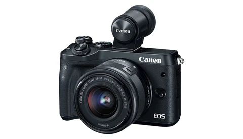 Canon EOS M6 Mark II mirrorless camera with EF-M 15-45mm lens and electronic viewfinder mounted on top.