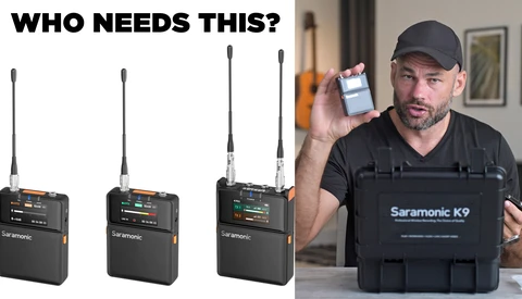 Three wireless audio receiver units displayed in a line, with a person holding a compact wireless transmitter unit in an indoor setting.