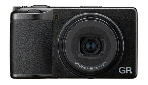 Ricoh GR compact digital camera with fixed 18.3mm lens, displayed from above against white background.