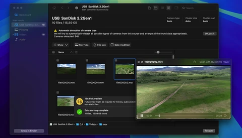 Screenshot of file management interface showing landscape video files with preview panel displaying a pastoral mountain valley scene.