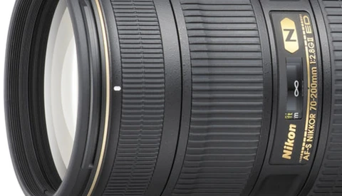 Nikon AF-S 24-70mm f/2.8G telephoto zoom lens with gold lettering and ribbed focus ring.