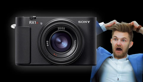 Sony RX1R compact camera with Zeiss lens displayed next to a person with a surprised expression.