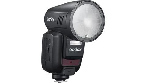 Godox speedlight flash unit with reflector and control panel mounted on shoe base.