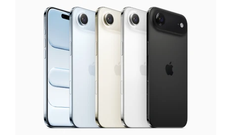 Five smartphones arranged in a row, displayed in blue, white, beige, white, and black finishes with single rear cameras.
