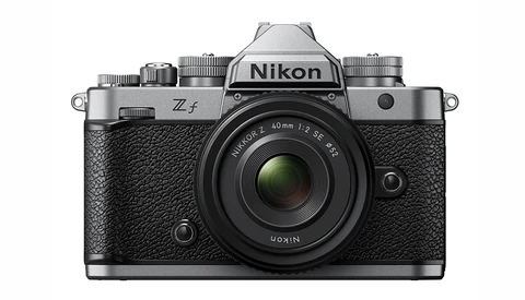 Nikon Zf mirrorless camera with 40mm f/2 lens mounted, shown from front against white background.