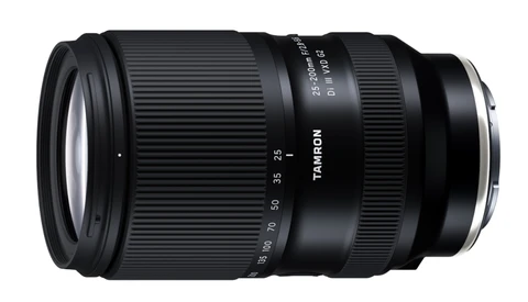 Tamron 28-200mm telephoto zoom lens with focus and aperture rings visible against white background.