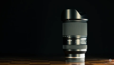 Telephoto lens mounted on wooden surface against black background.