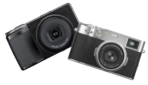 Two vintage rangefinder cameras displayed side by side against a white background.