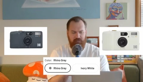 Screenshot showing color options for a compact instant camera in Rhino Grey and Ivory White.
