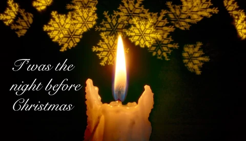Lit candle with golden snowflake overlays and 'Twas the night before Christmas' text on dark background.