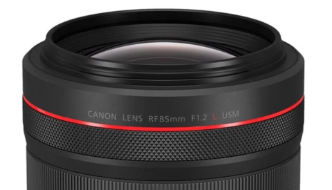 Canon RF 85mm F1.2L USM lens with red accent ring and textured grip band.