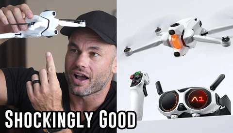 Man holding a compact white drone while gesturing enthusiastically at camera.