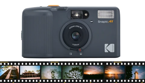 Kodak Snapic A1 compact film camera with flash and Kodak lens, shown above a film strip of landscape photographs.