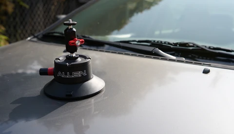 Allen suction cup camera mount mounted on vehicle hood with ball head