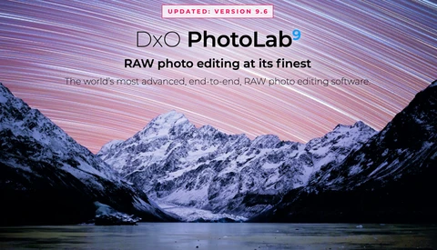 Screenshot of DxO PhotoLab 9 software interface showing a snow-covered mountain landscape at sunset.