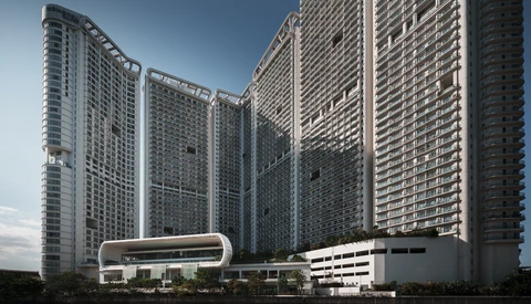 Architectural rendering of tall residential towers with curved base structures against clear blue sky.