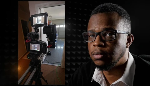 Two-camera rig mounted on tripod with monitors, positioned in an interior space; portrait of man wearing glasses on right.