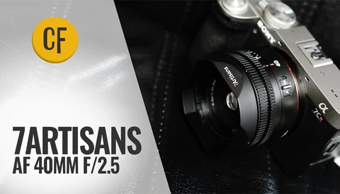 7Artisans 40mm f/2.5 autofocus lens mounted on a mirrorless camera body against a dark background.